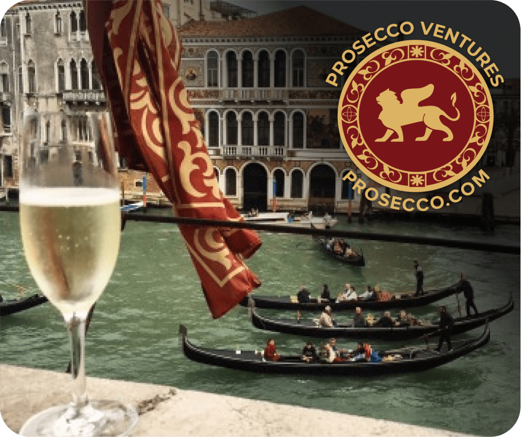 Prosecco on the canal in Venice, Italy with Michael Goldstein and boat race.
